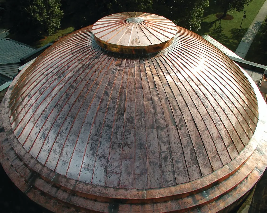 Craftsman Roofing crew installing a new roof in Newport